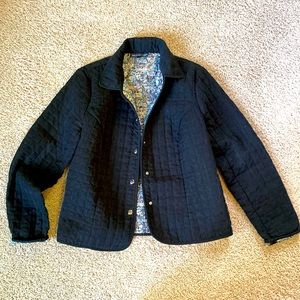 Quilted Black Jacket with Patterned Interior